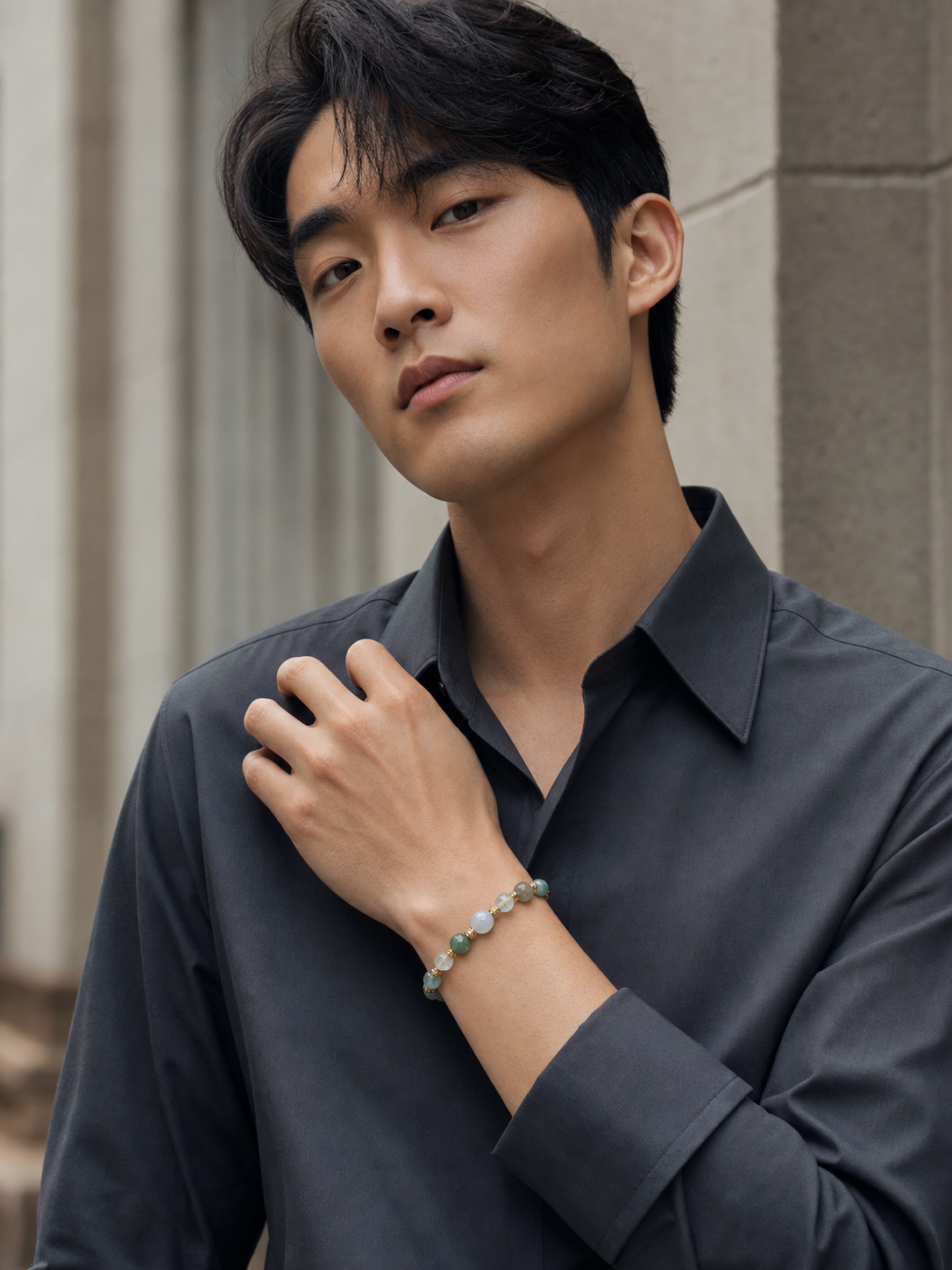 Model in a quiet city setting wearing the Sea Glass bracelet